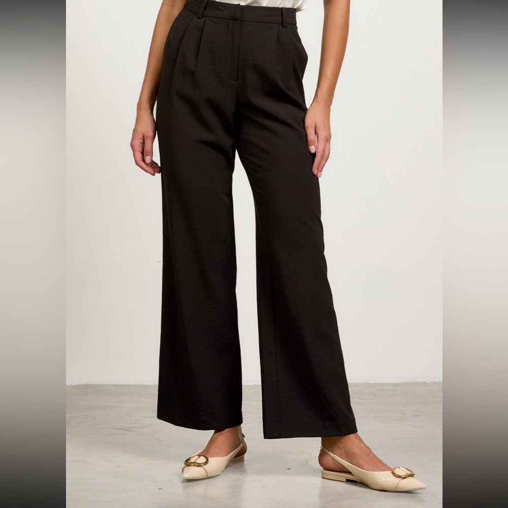 New with tags. Skies are Blue trouser pants. Black. Wide leg high waist